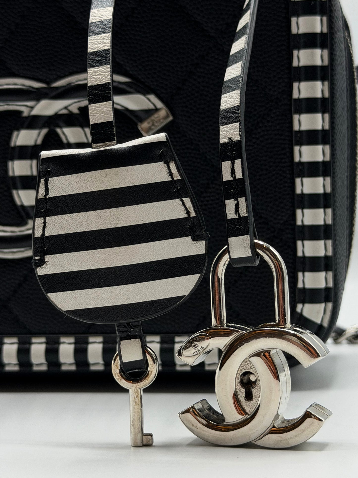 CHANEL | CC Filigree Vanity Case Small Black Quilted Caviar with Black & White Stripes