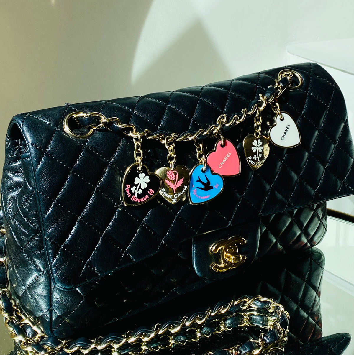 CHANEL | Limited Edition Valentine Charm Porte Bonheur Flap Bag in Black