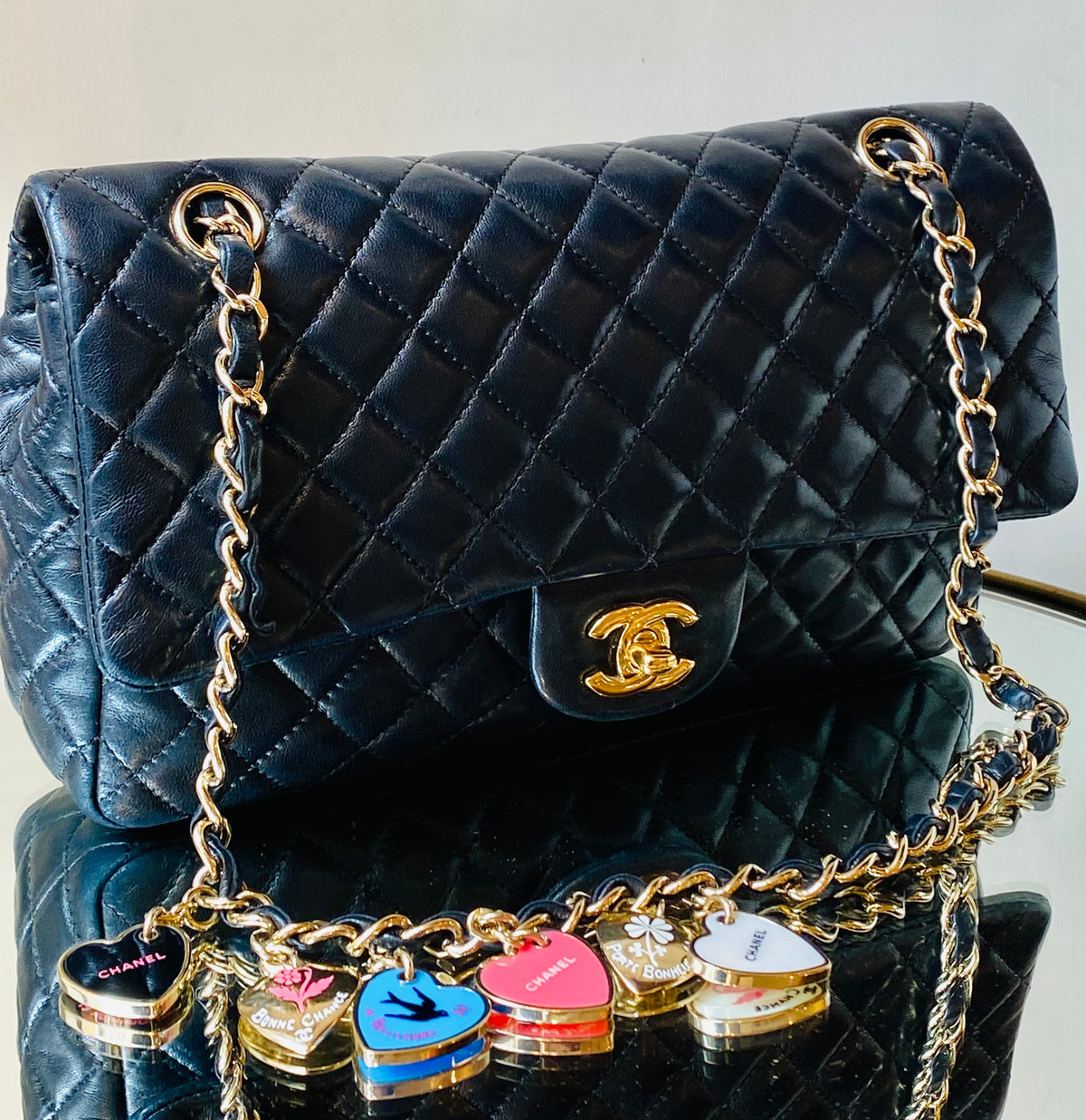 CHANEL | Limited Edition Valentine Charm Porte Bonheur Flap Bag in Black