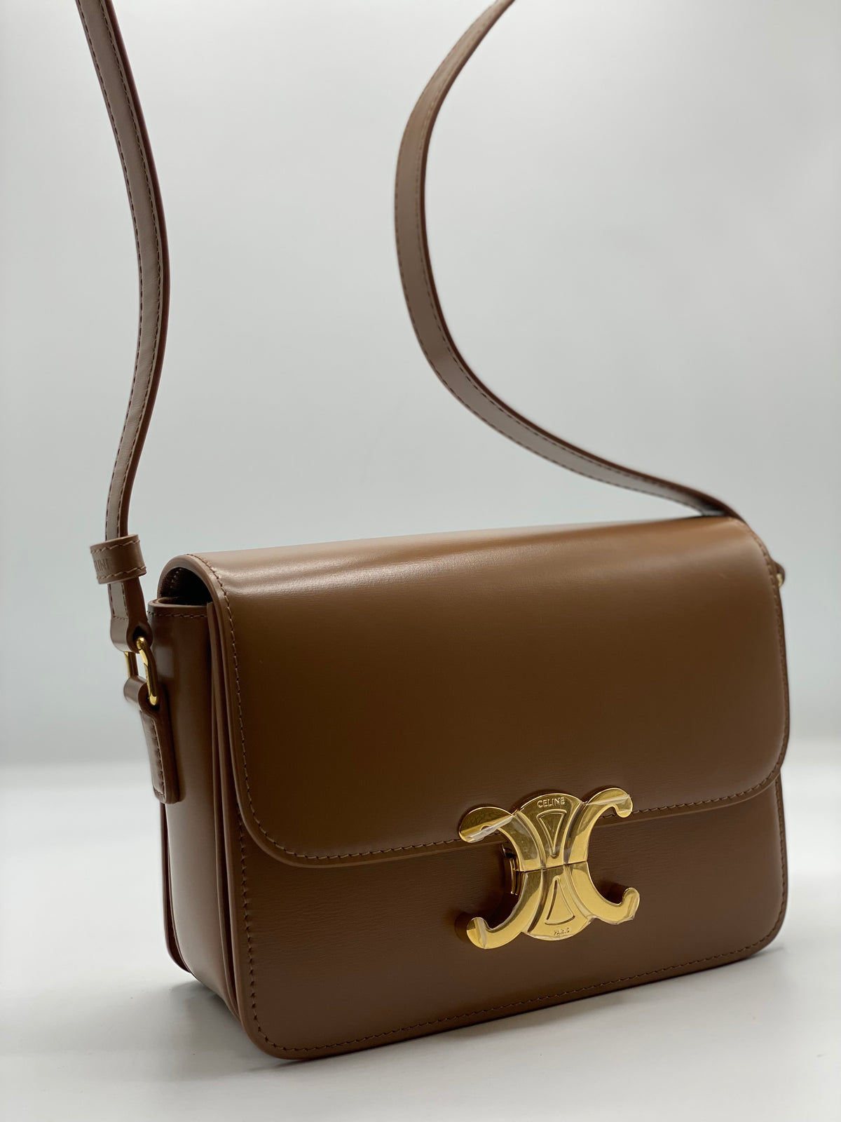 CELINE | Teen Triomphe Bag In Shiny Calfskin Bronze