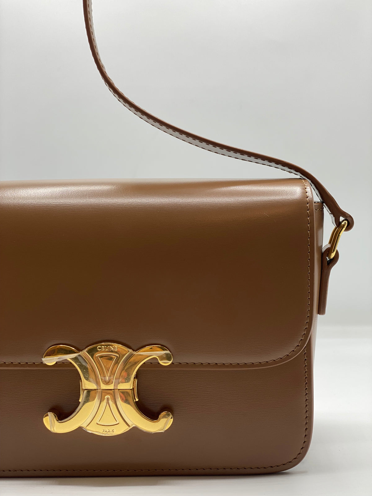 CELINE | Teen Triomphe Bag In Shiny Calfskin Bronze