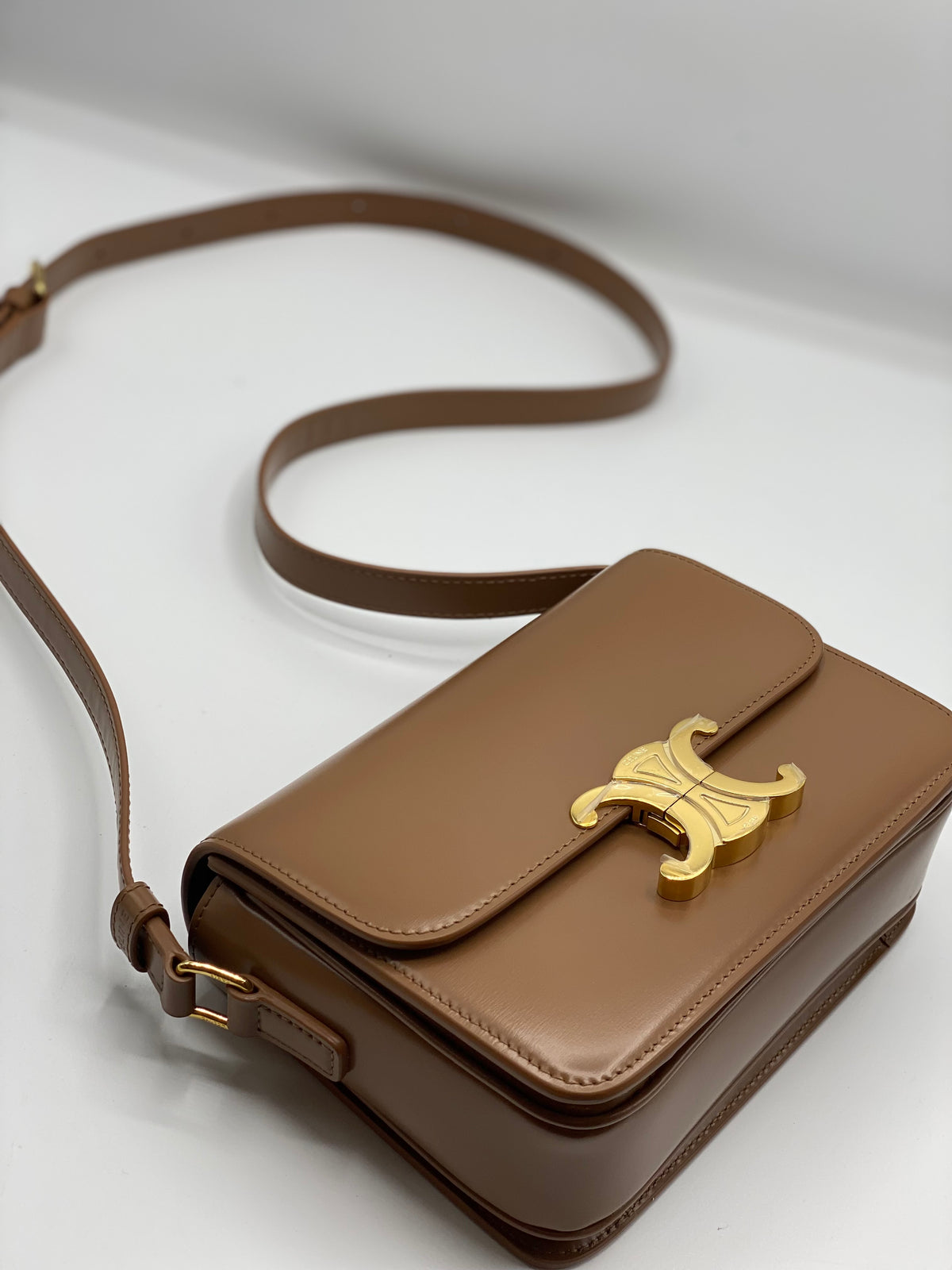 CELINE | Teen Triomphe Bag In Shiny Calfskin Bronze